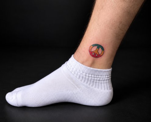 Tatouage peace réalisé par L'Art de l'Expression Tatouage au Havre